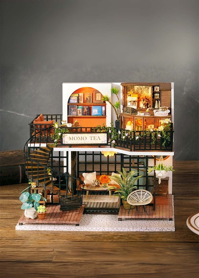 DIY miniature house kit of a two-story garden loft café with spiral stairs, tiny furniture, plants, and glowing lights – perfect for craft ideas, diy and crafts, miniature mansion lovers, and diy miniature home building.