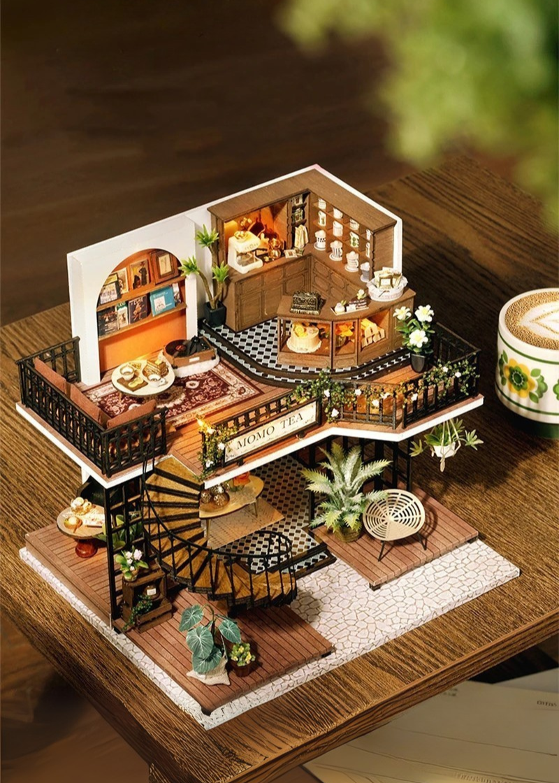 DIY miniature house kit of a two-story garden loft café with spiral stairs, tiny furniture, plants, and glowing lights – perfect for craft ideas, diy and crafts, miniature mansion lovers, and diy miniature home building.