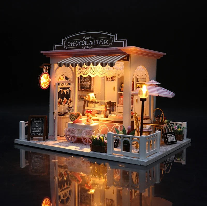 DIY miniature chocolate shop kit – a tiny dollhouse-style chocolatier with LED lights, perfect for book nook lovers, miniature mansion collectors, and fans of DIY crafts, miniatures, and small DIY houses.