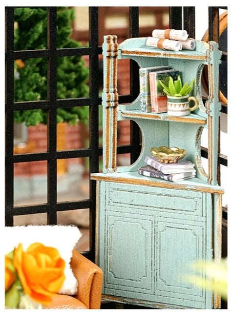 DIY miniature house kit of a two-story garden loft café with spiral stairs, tiny furniture, plants, and glowing lights – perfect for craft ideas, diy and crafts, miniature mansion lovers, and diy miniature home building.