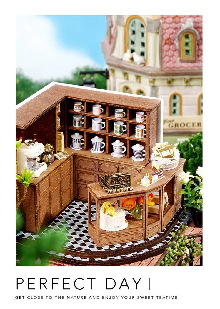 DIY miniature house kit of a two-story garden loft café with spiral stairs, tiny furniture, plants, and glowing lights – perfect for craft ideas, diy and crafts, miniature mansion lovers, and diy miniature home building.
