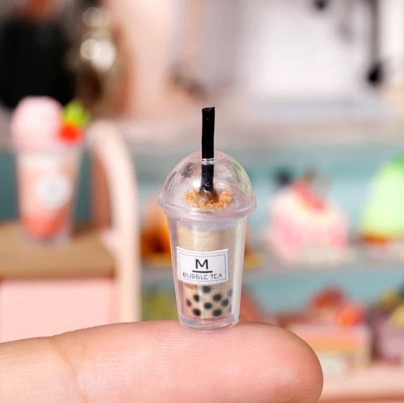 DIY miniature tea shop kit with pastel counters, bubble tea decor, and tiny accessories — perfect for miniatures lovers, DIY crafts, book nook fans, and small DIY house projects.