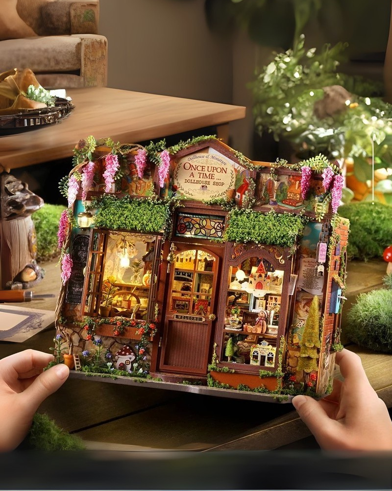 DIY Mini House kit featuring a whimsical miniature dollhouse store called “Once Upon a Time Dollhouse Shop,” with fairy tale décor, tiny dollhouses, and detailed interiors. Perfect for DIY and crafts lovers, miniature mansion collectors, and book nook enthusiasts looking for magical craft ideas.