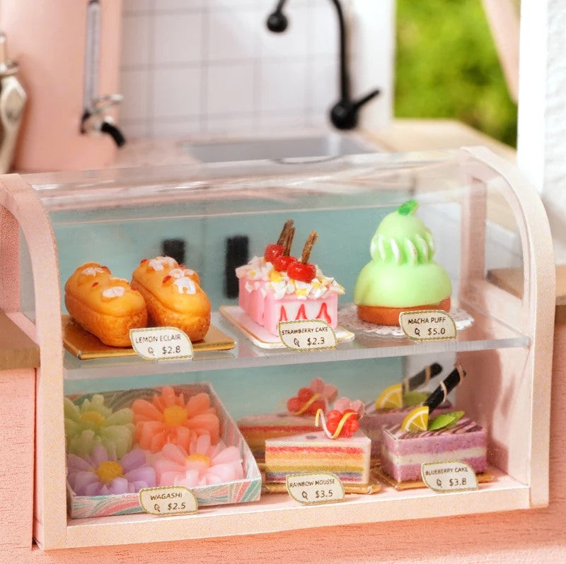 DIY miniature tea shop kit with pastel counters, bubble tea decor, and tiny accessories — perfect for miniatures lovers, DIY crafts, book nook fans, and small DIY house projects.