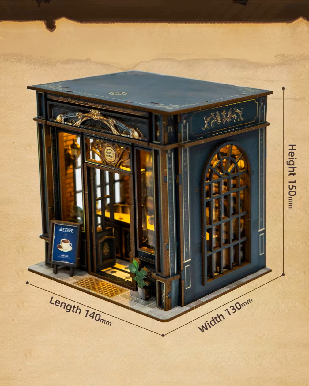 Miniature DIY book nook of a dark vintage-style café with glowing warm lights, ornate black storefront, and a coffee sign that reads “Jadeite Coffee.”