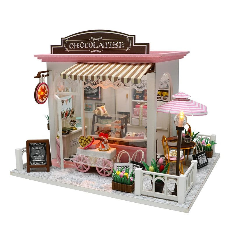 DIY miniature chocolate shop kit – a tiny dollhouse-style chocolatier with LED lights, perfect for book nook lovers, miniature mansion collectors, and fans of DIY crafts, miniatures, and small DIY houses.