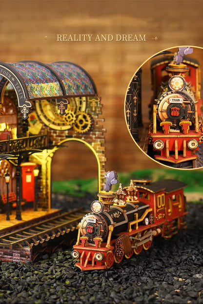 DIY book nook kit “Platform Arcane,” featuring a mechanical fantasy train station with glowing lights, gears, arched glass roof, red locomotive, and magical details. Ideal for DIY and crafts lovers, fantasy readers, and miniature train enthusiasts.