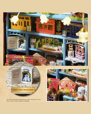 DIY Mini House kit featuring a whimsical miniature dollhouse store called “Once Upon a Time Dollhouse Shop,” with fairy tale décor, tiny dollhouses, and detailed interiors. Perfect for DIY and crafts lovers, miniature mansion collectors, and book nook enthusiasts looking for magical craft ideas.