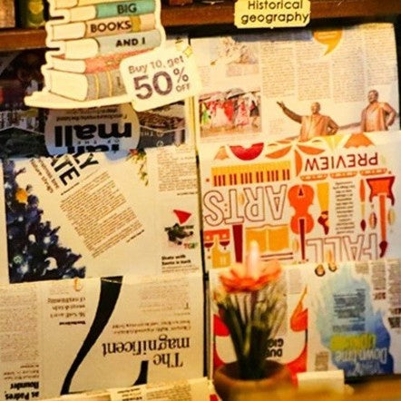 DIY book nook kit featuring a miniature bookstore with tiny books, shelves, cozy lighting, and vintage details — ideal for fans of miniatures, DIY crafts, scale models, and small DIY houses.