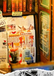 DIY book nook kit featuring a miniature bookstore with tiny books, shelves, cozy lighting, and vintage details — ideal for fans of miniatures, DIY crafts, scale models, and small DIY houses.
