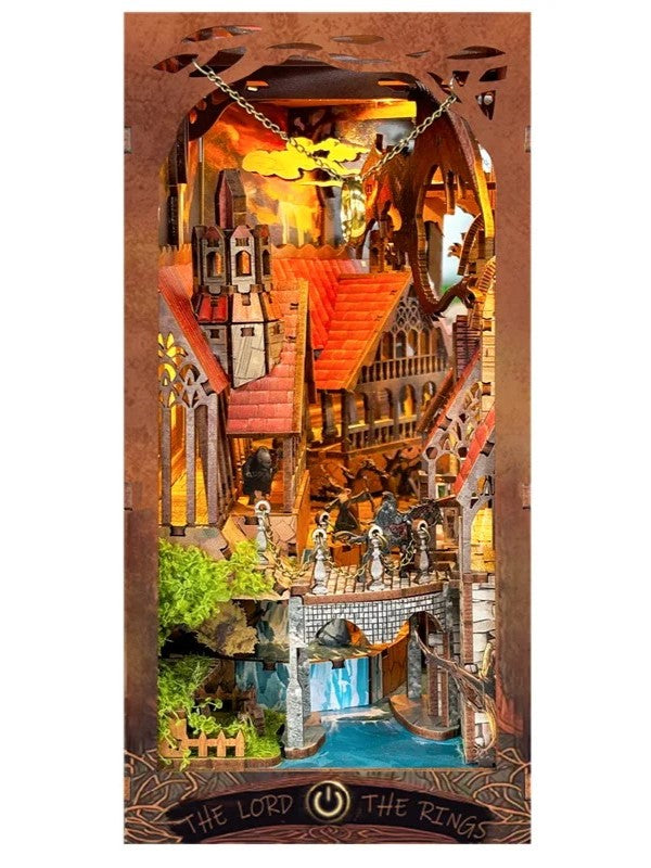 DIY fantasy book nook kit featuring a dragon-themed miniature valley with stone bridges, rooftops, and glowing landscape — ideal for miniature fans, DIY crafts, and book nook collectors.