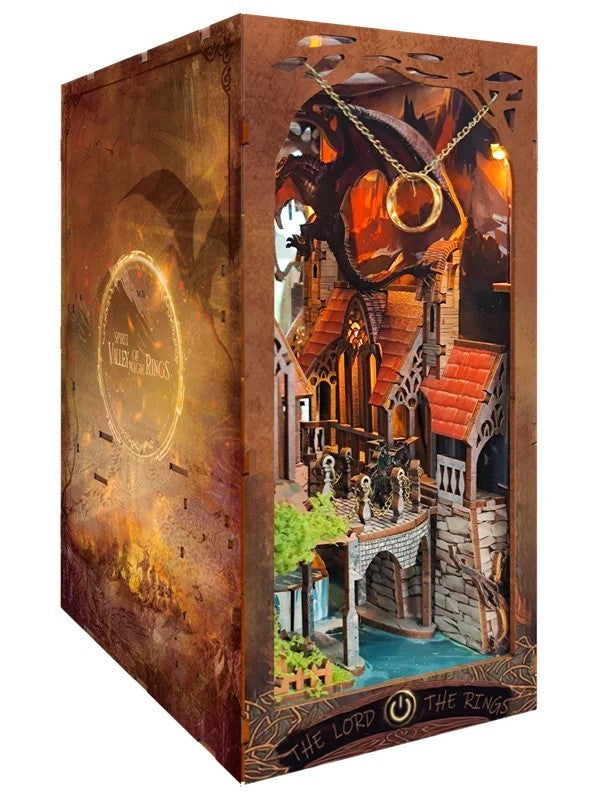 DIY fantasy book nook kit featuring a dragon-themed miniature valley with stone bridges, rooftops, and glowing landscape — ideal for miniature fans, DIY crafts, and book nook collectors.