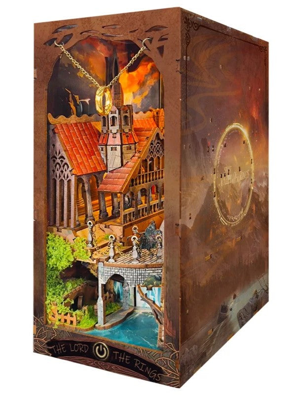 DIY fantasy book nook kit featuring a dragon-themed miniature valley with stone bridges, rooftops, and glowing landscape — ideal for miniature fans, DIY crafts, and book nook collectors.