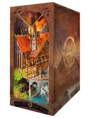 DIY fantasy book nook kit featuring a dragon-themed miniature valley with stone bridges, rooftops, and glowing landscape — ideal for miniature fans, DIY crafts, and book nook collectors.