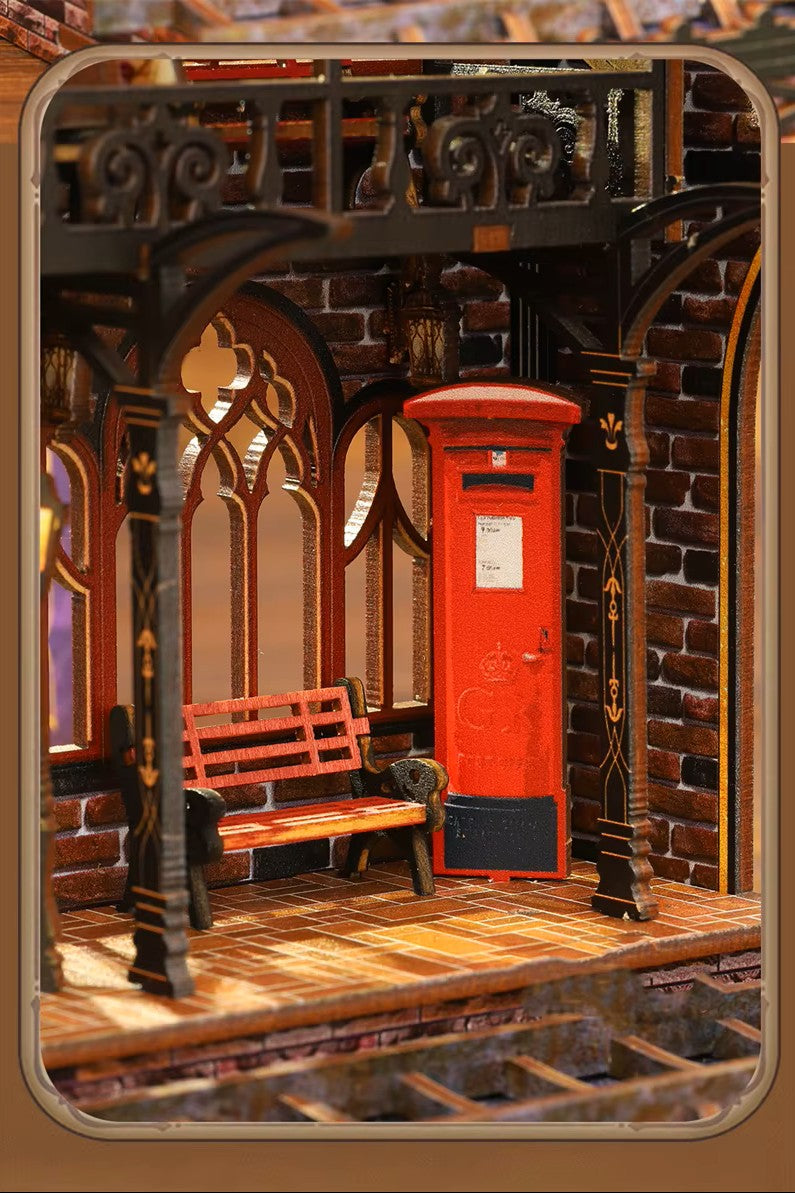 DIY book nook kit “Platform Arcane,” featuring a mechanical fantasy train station with glowing lights, gears, arched glass roof, red locomotive, and magical details. Ideal for DIY and crafts lovers, fantasy readers, and miniature train enthusiasts.