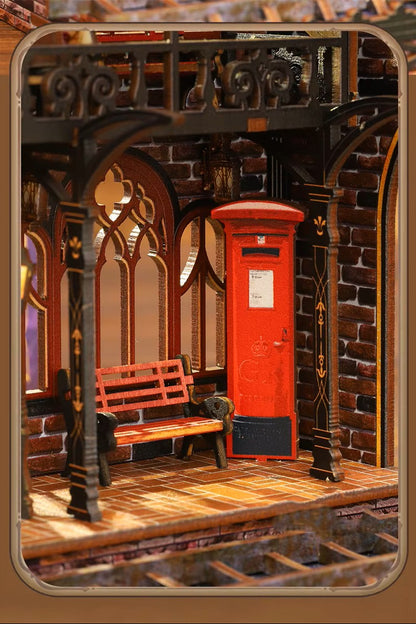 DIY book nook kit “Platform Arcane,” featuring a mechanical fantasy train station with glowing lights, gears, arched glass roof, red locomotive, and magical details. Ideal for DIY and crafts lovers, fantasy readers, and miniature train enthusiasts.