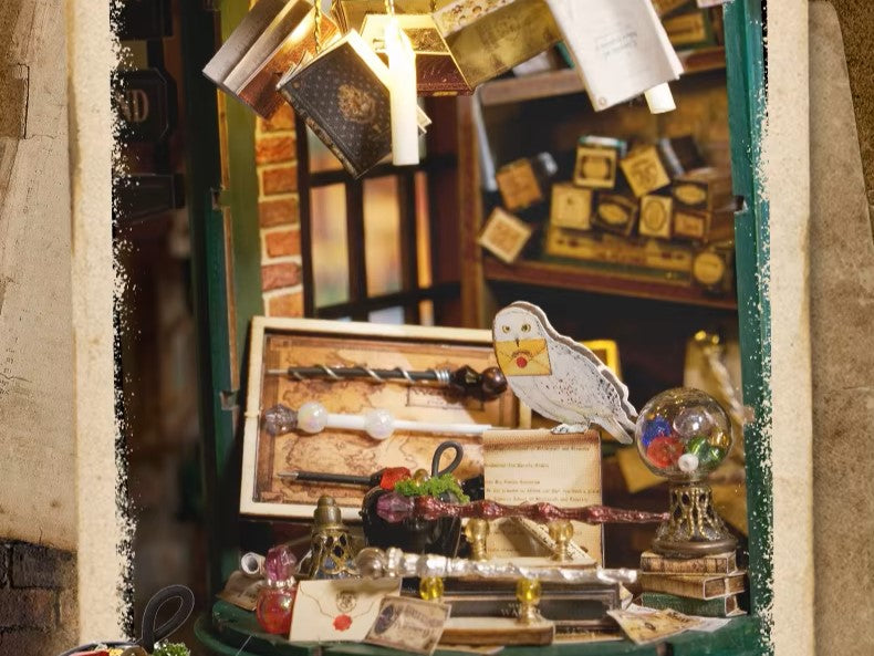 DIY miniature magic shop kit with tiny potions, spell books, glowing lights, and detailed scale model decor — perfect for miniature collectors, DIY crafts, and small DIY house lovers.