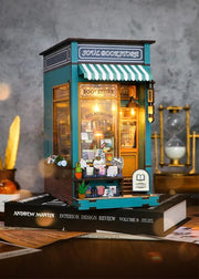 DIY book nook kit featuring a miniature bookstore with tiny books, shelves, cozy lighting, and vintage details — ideal for fans of miniatures, DIY crafts, scale models, and small DIY houses.