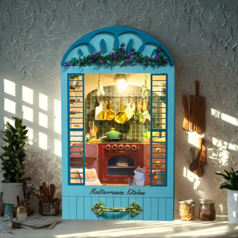 DIY book nook miniature kitchen with Mediterranean tiles, hanging copper pots, red oven, and open blue shutters.