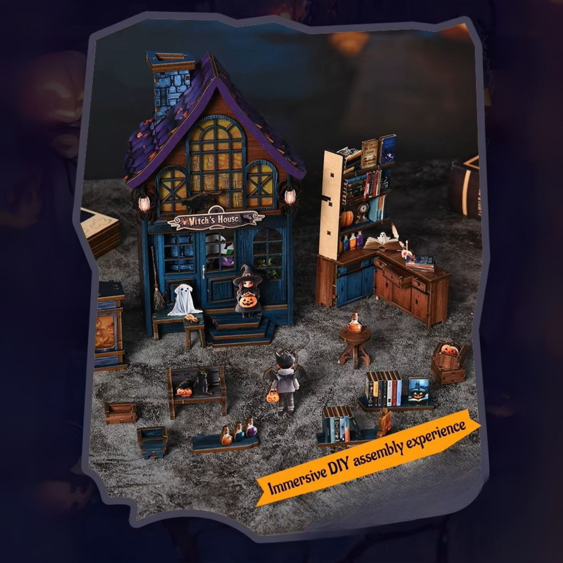 DIY book nook kit “Pumpkin Trick-or-Treat,” featuring a witch’s house with glowing windows, jack-o’-lanterns, trick-or-treaters, bats, and Halloween decorations. A festive miniature for DIY and crafts lovers and seasonal book nook collectors.