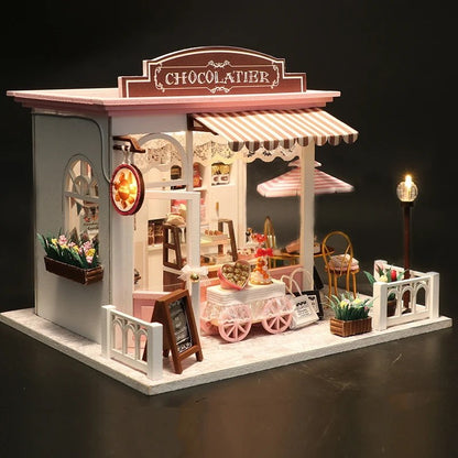 DIY miniature chocolate shop kit – a tiny dollhouse-style chocolatier with LED lights, perfect for book nook lovers, miniature mansion collectors, and fans of DIY crafts, miniatures, and small DIY houses.