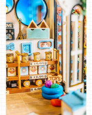 DIY miniature pet store kit featuring a tiny storefront, cats, dogs, detailed mini furniture, and scale model accessories — perfect for miniature lovers and DIY crafts.