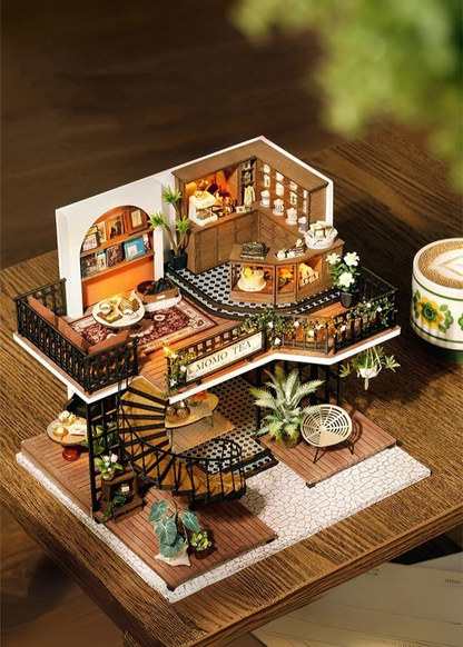 DIY miniature house kit of a two-story garden loft café with spiral stairs, tiny furniture, plants, and glowing lights – perfect for craft ideas, diy and crafts, miniature mansion lovers, and diy miniature home building.