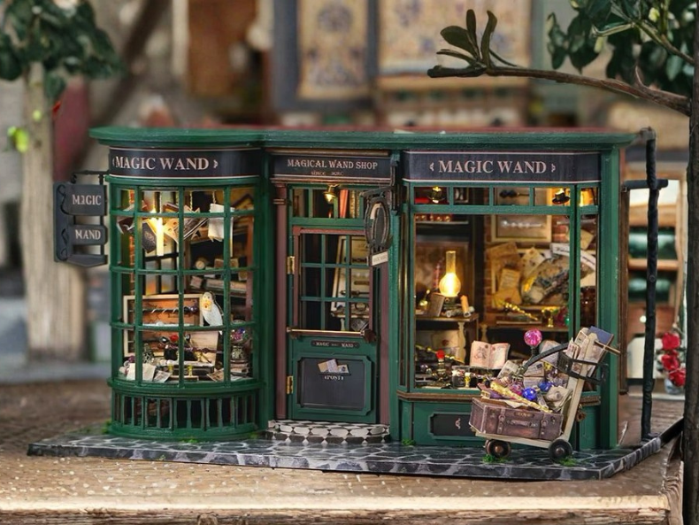 DIY miniature magic shop kit with tiny potions, spell books, glowing lights, and detailed scale model decor — perfect for miniature collectors, DIY crafts, and small DIY house lovers.