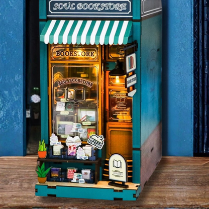 DIY book nook kit featuring a miniature bookstore with tiny books, shelves, cozy lighting, and vintage details — ideal for fans of miniatures, DIY crafts, scale models, and small DIY houses.