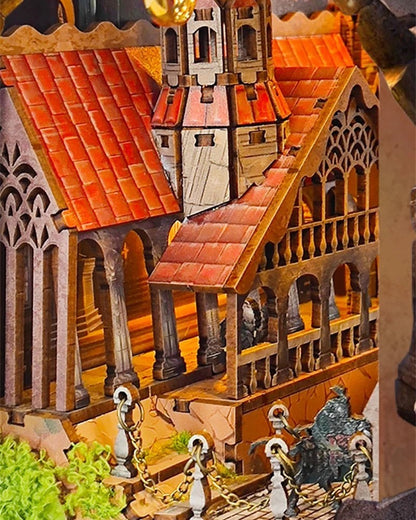 DIY fantasy book nook kit featuring a dragon-themed miniature valley with stone bridges, rooftops, and glowing landscape — ideal for miniature fans, DIY crafts, and book nook collectors.