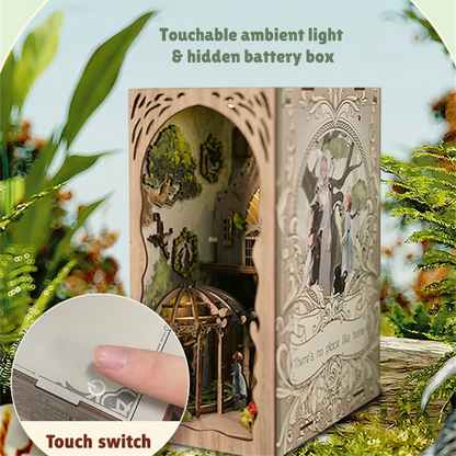 DIY book nook kit “Woodland Tales,” inspired by The Wizard of Oz. Features a glowing forest path with Dorothy and whimsical forest details. A magical DIY craft project for fans of storybook miniatures and fantasy-themed book nooks.