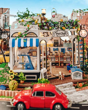 DIY miniature pet store kit featuring a tiny storefront, cats, dogs, detailed mini furniture, and scale model accessories — perfect for miniature lovers and DIY crafts.
