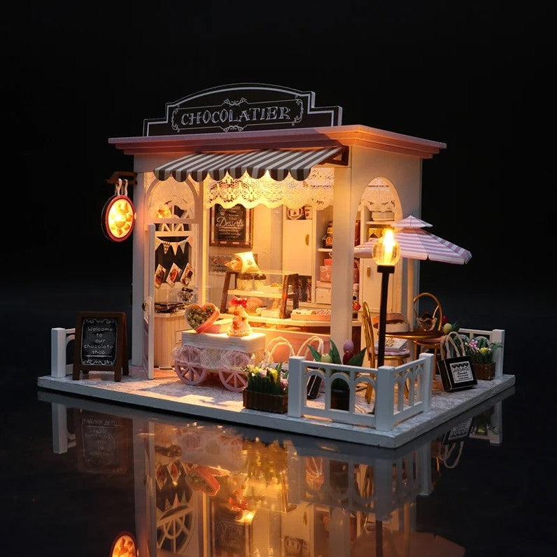 DIY miniature chocolate shop kit – a tiny dollhouse-style chocolatier with LED lights, perfect for book nook lovers, miniature mansion collectors, and fans of DIY crafts, miniatures, and small DIY houses.