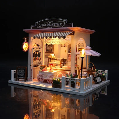 DIY miniature chocolate shop kit – a tiny dollhouse-style chocolatier with LED lights, perfect for book nook lovers, miniature mansion collectors, and fans of DIY crafts, miniatures, and small DIY houses.