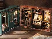 DIY miniature magic shop kit with tiny potions, spell books, glowing lights, and detailed scale model decor — perfect for miniature collectors, DIY crafts, and small DIY house lovers.