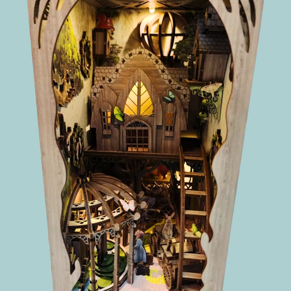 DIY book nook kit “Woodland Tales,” inspired by The Wizard of Oz. Features a glowing forest path with Dorothy and whimsical forest details. A magical DIY craft project for fans of storybook miniatures and fantasy-themed book nooks.