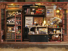 DIY miniature magic shop kit with tiny potions, spell books, glowing lights, and detailed scale model decor — perfect for miniature collectors, DIY crafts, and small DIY house lovers.