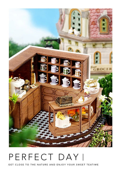 DIY miniature house kit of a two-story garden loft café with spiral stairs, tiny furniture, plants, and glowing lights – perfect for craft ideas, diy and crafts, miniature mansion lovers, and diy miniature home building.
