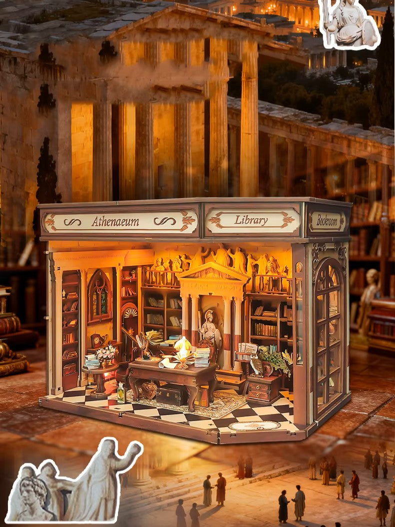 DIY miniature house kit styled as an Athenaeum library with classical columns, bookshelves, and warm lighting in an old-world study.
