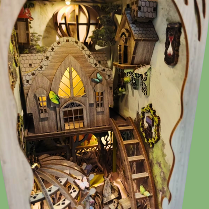DIY book nook kit “Woodland Tales,” inspired by The Wizard of Oz. Features a glowing forest path with Dorothy and whimsical forest details. A magical DIY craft project for fans of storybook miniatures and fantasy-themed book nooks.