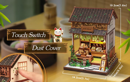 DIY mini house kit “Japanese Sweets Store,” featuring a traditional candy and wagashi shop with miniature desserts, wooden shelves, hanging banners, and tiny gift boxes. A detailed DIY and crafts project perfect for fans of Japanese culture and making miniatures.