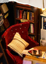 DIY book nook kit featuring a miniature bookstore with tiny books, shelves, cozy lighting, and vintage details — ideal for fans of miniatures, DIY crafts, scale models, and small DIY houses.