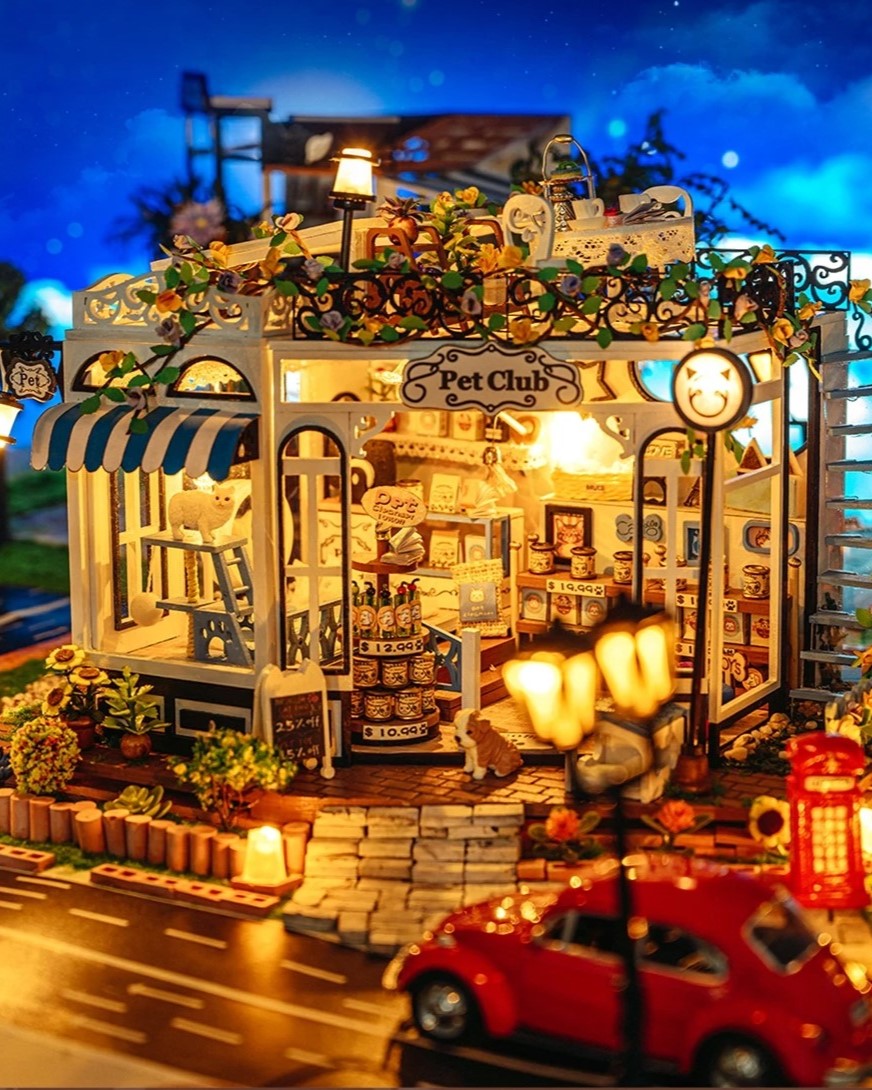 DIY miniature pet store kit featuring a tiny storefront, cats, dogs, detailed mini furniture, and scale model accessories — perfect for miniature lovers and DIY crafts.