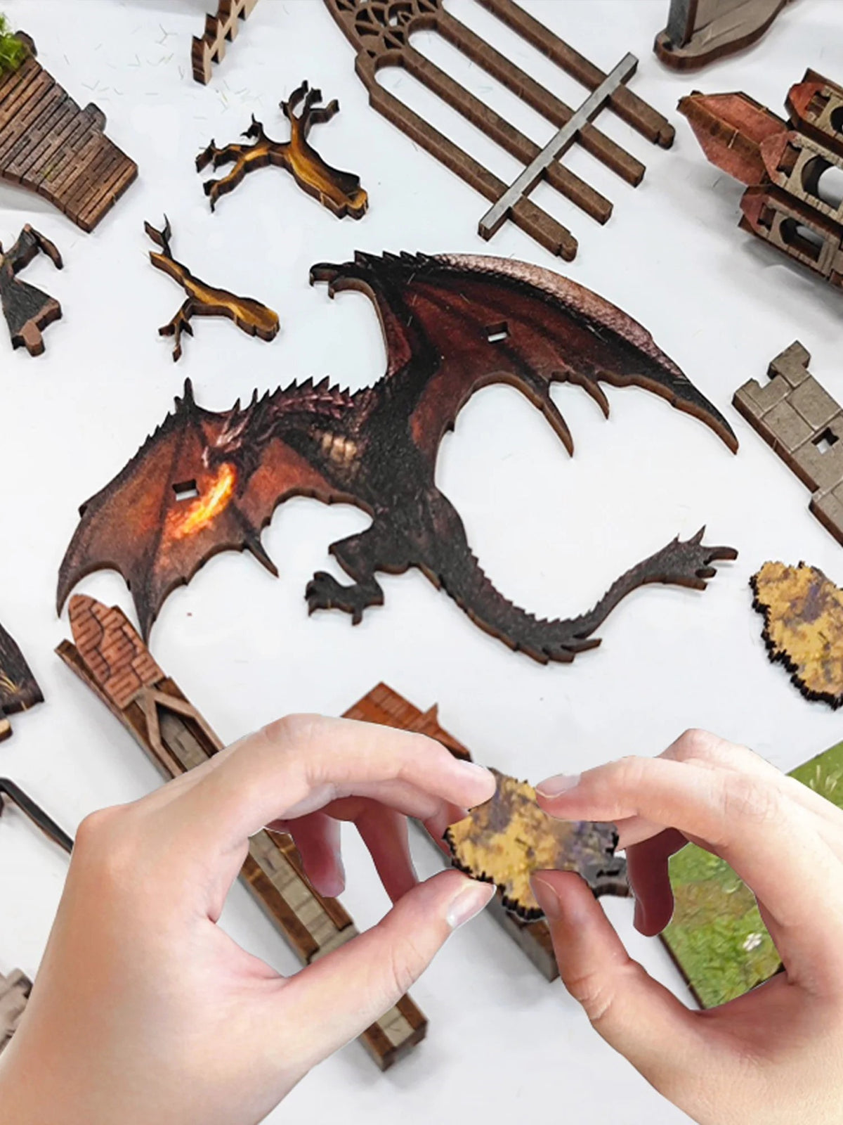 DIY fantasy book nook kit featuring a dragon-themed miniature valley with stone bridges, rooftops, and glowing landscape — ideal for miniature fans, DIY crafts, and book nook collectors.