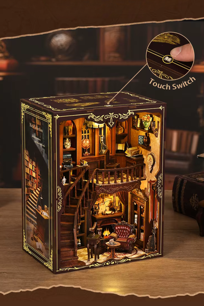 DIY book nook of an antique library scene with gothic-style arches, spiral stairs, a cozy reading nook, and glowing lamplight, styled in dark academia tones.