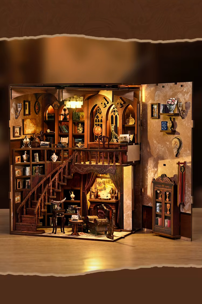 DIY book nook of an antique library scene with gothic-style arches, spiral stairs, a cozy reading nook, and glowing lamplight, styled in dark academia tones.