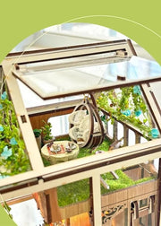 DIY garden book nook kit featuring a miniature outdoor café, greenery, tiny table setup, and rustic path — perfect for miniature lovers, DIY crafts, book nook fans, and small DIY house decor.