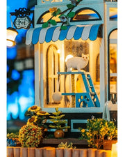 DIY miniature pet store kit featuring a tiny storefront, cats, dogs, detailed mini furniture, and scale model accessories — perfect for miniature lovers and DIY crafts.