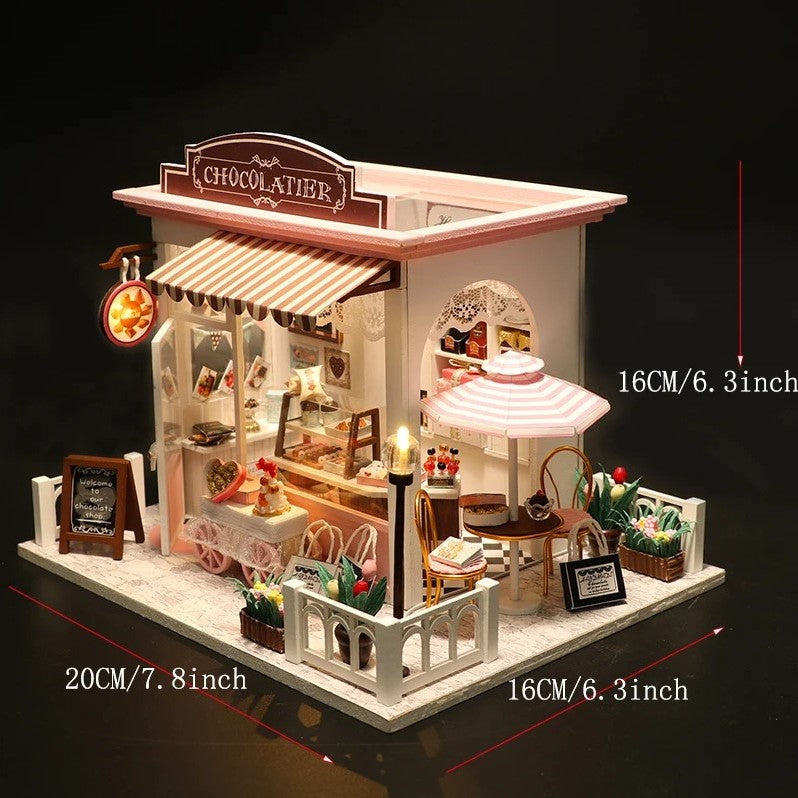 DIY miniature chocolate shop kit – a tiny dollhouse-style chocolatier with LED lights, perfect for book nook lovers, miniature mansion collectors, and fans of DIY crafts, miniatures, and small DIY houses.