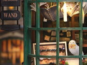 DIY miniature magic shop kit with tiny potions, spell books, glowing lights, and detailed scale model decor — perfect for miniature collectors, DIY crafts, and small DIY house lovers.